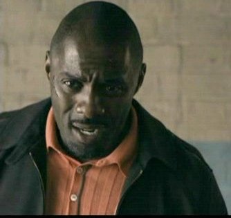 Idris Elba as Mumbles in RocknRolla